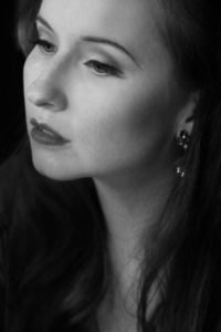 Model: Mary Kate Wiles, Photography: Christoper Higgins, on set of "The Case of The Gilded Lily"