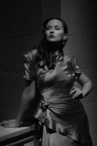 Model: Mary Kate Wiles, Photography: Christoper Higgins, on set of "The Case of The Gilded Lily"